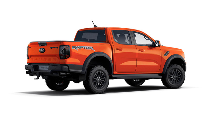 Ford Ranger Raptor, orange Pickup-Truck, robuste Bauweise, geländetauglich, sportliches Design.